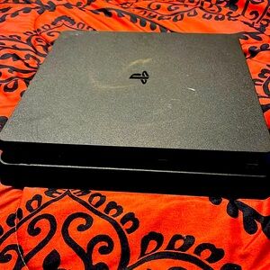 Good condition ps4 has a white remote and comes with all cables